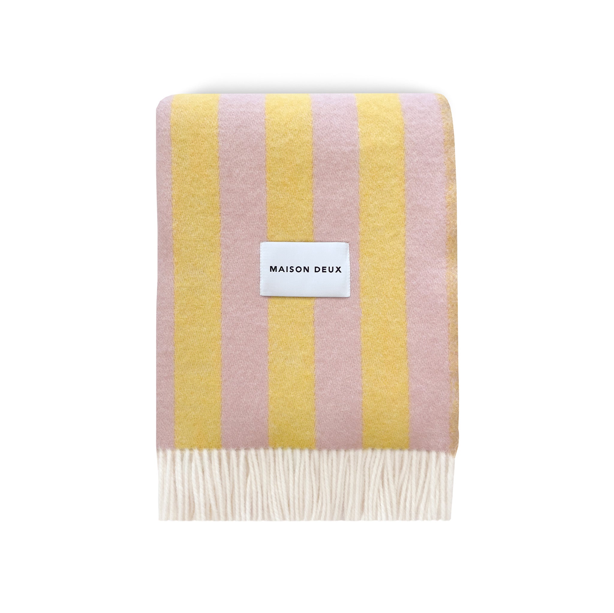 Maison Deux Candy Wrap Blanket in pink and yellow lambswool, reversible candy-stripe design, cozy modern throw.