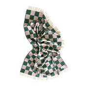 Maison Deux Checkerboard Blanket in green and pink lambswool with bold reversible checkerboard design.