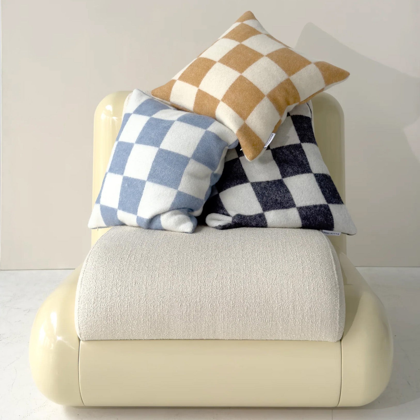 Maison Deux Checkerboard Cushion Cover in 100% wool, jacquard-woven with bold graphic checkerboard pattern.