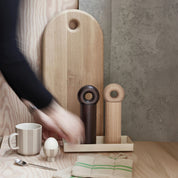 OYOY Living Design Hoop Mill Grinder in FSC-certified ash wood, available in Natural or Dark finish, two sizes. CrushGrind® mechanism for salt, pepper, or spices.