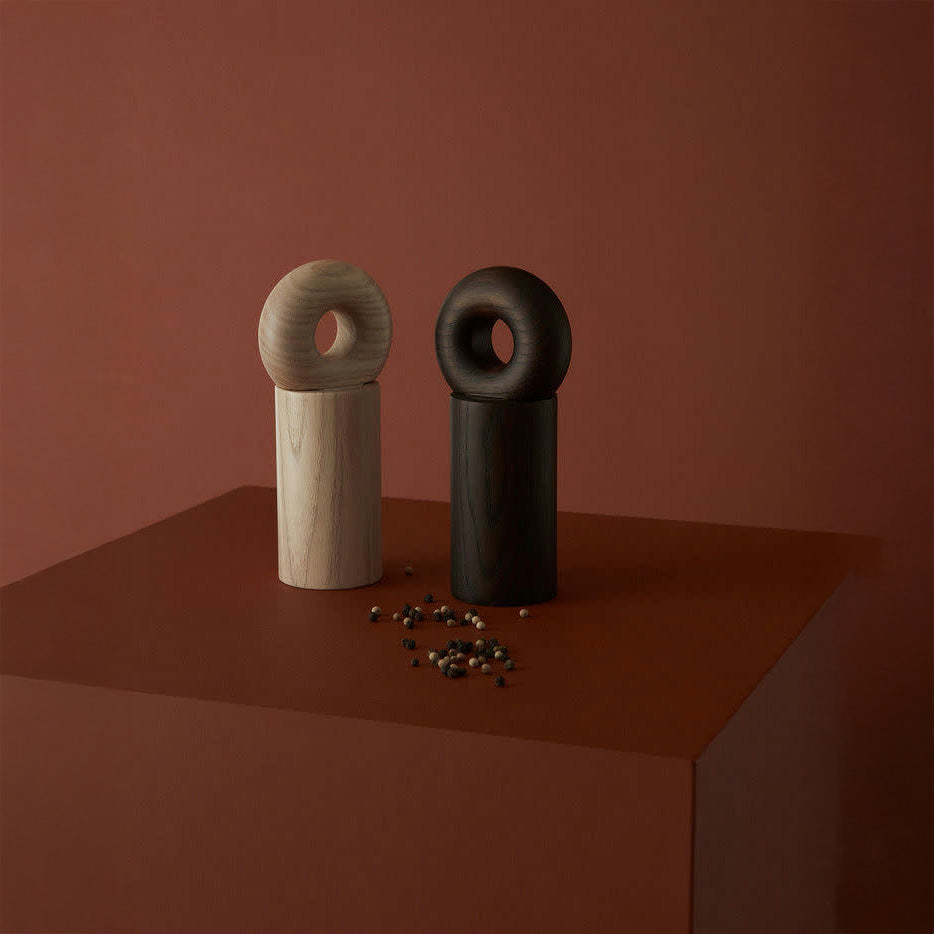 OYOY Living Design Hoop Mill Grinder in FSC-certified ash wood, available in Natural or Dark finish, two sizes. CrushGrind® mechanism for salt, pepper, or spices.