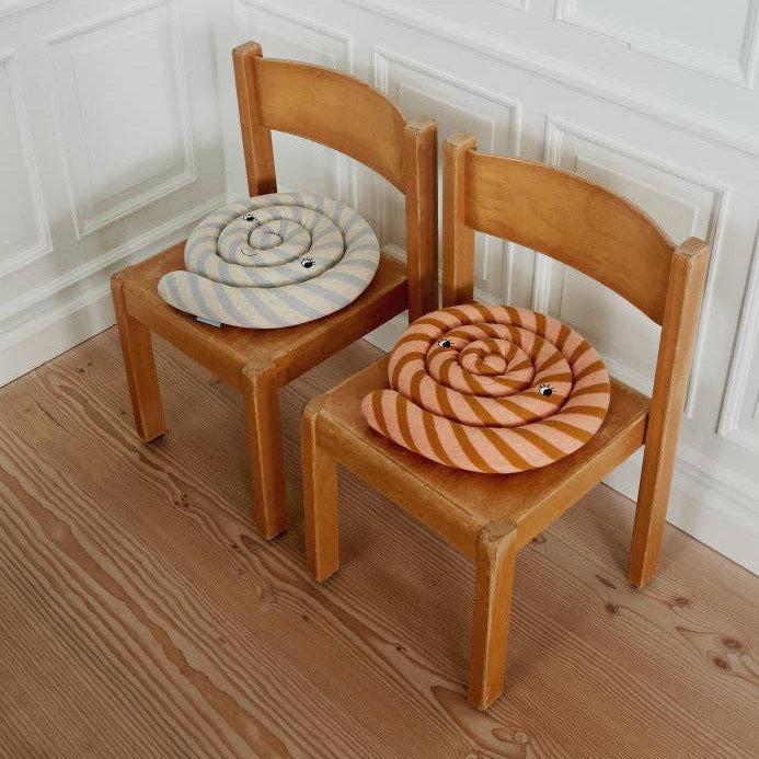 OYOY Lollipop Cushions in blue and caramel striped cotton knit with soft filling, candy-shaped pillow for kids’ or adults’ décor.