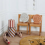 OYOY Lollipop Cushions in blue and caramel striped cotton knit with soft filling, candy-shaped pillow for kids’ or adults’ décor.