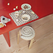 OYOY Lollipop Cushion in blue striped cotton knit with soft filling, candy-shaped pillow for kids’ or adults’ décor.