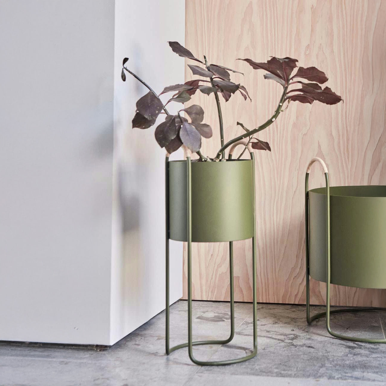 Maki Plant Box in Clay, Nutmeg, or Olive with rattan handles, shown in Low and High versions.
