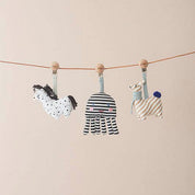 OYOY Octopus Baby Carrier Clip in organic cotton, black-and-white striped octopus with embroidered face and wooden logo clip.