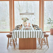 OYOY Living Design Striped Tablecloth in organic cotton with bold striped pattern. Available in multiple colors and sizes (200 × 140 cm or 260 × 140 cm).