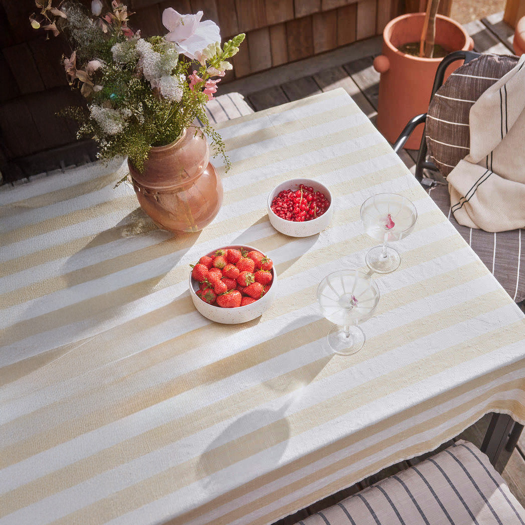 OYOY Living Design Striped Tablecloth in organic cotton with bold striped pattern. Available in multiple colors and sizes (200 × 140 cm or 260 × 140 cm).