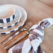 Toppu Bowl in striped stoneware by OYOY Living Design. Handmade, hand-painted, dishwasher and microwave safe. Available in two sizes.