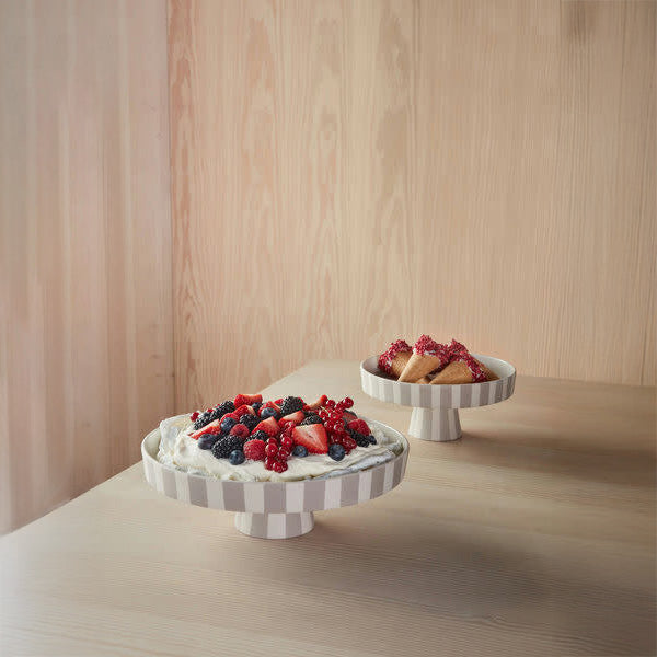 Toppu Tray by OYOY Living Design, handmade ceramic with striped design, available in multiple sizes and earthy colors.