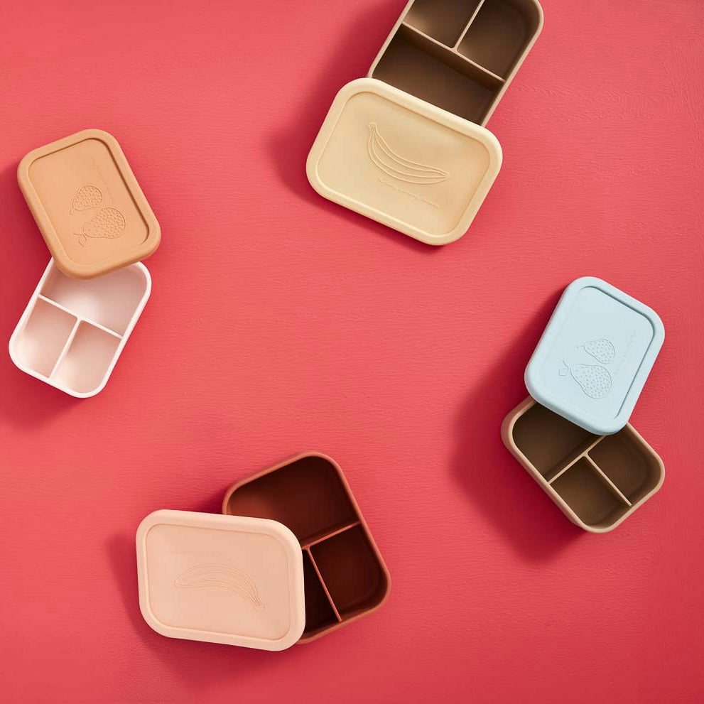 OYOY Yummy Lunch Box in silicone with Yummy print, three compartments for snacks and lunches.