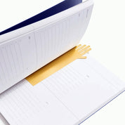 Poketo Brass Hand Bookmark, polished golden hand-shaped page marker. Durable and stylish gift for readers and design lovers.