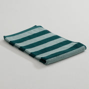 RATIA Stripe Hand Towel in two shades of green, 50 × 70 cm, 100% cotton—pairs with RATIA striped bathrobe.