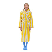 RATIA Unisex Striped Bathrobe in warm yellow/light grey terry cotton blend with belt, raglan sleeves, and pockets. Scandinavian unisex bathrobe, available in S/M and L/XL, made in Portugal.