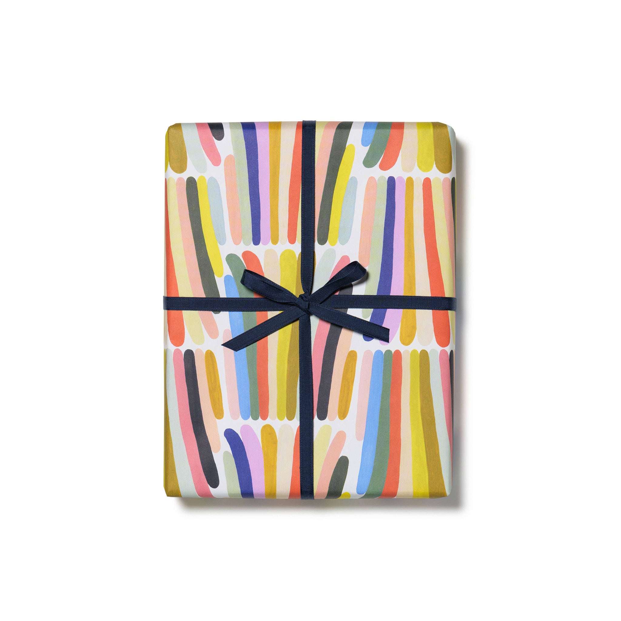 Red Cap Cards Rainbow Stripes Wrapping Paper, illustrated by Kate Pugsley. Bright rainbow gift wrap, recycled paper set of 3 rolled sheets, 19 × 27 inches.