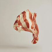 Stilleben Sweater Throw in orange 100% combed wool with tone-on-tone stripes.