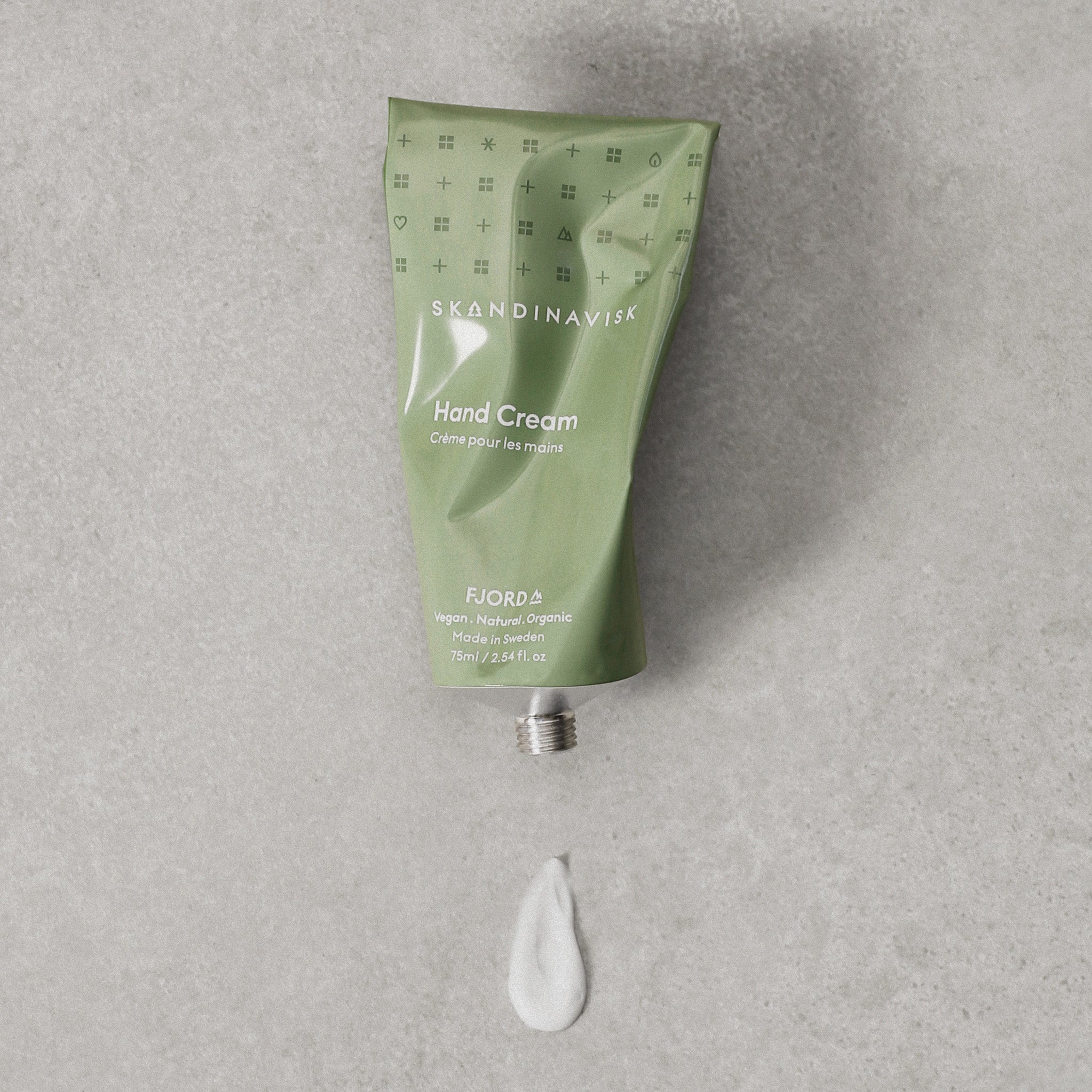 Skandinavisk Fjord 75 ml hand cream in recycled aluminum tube with FSC-certified packaging.