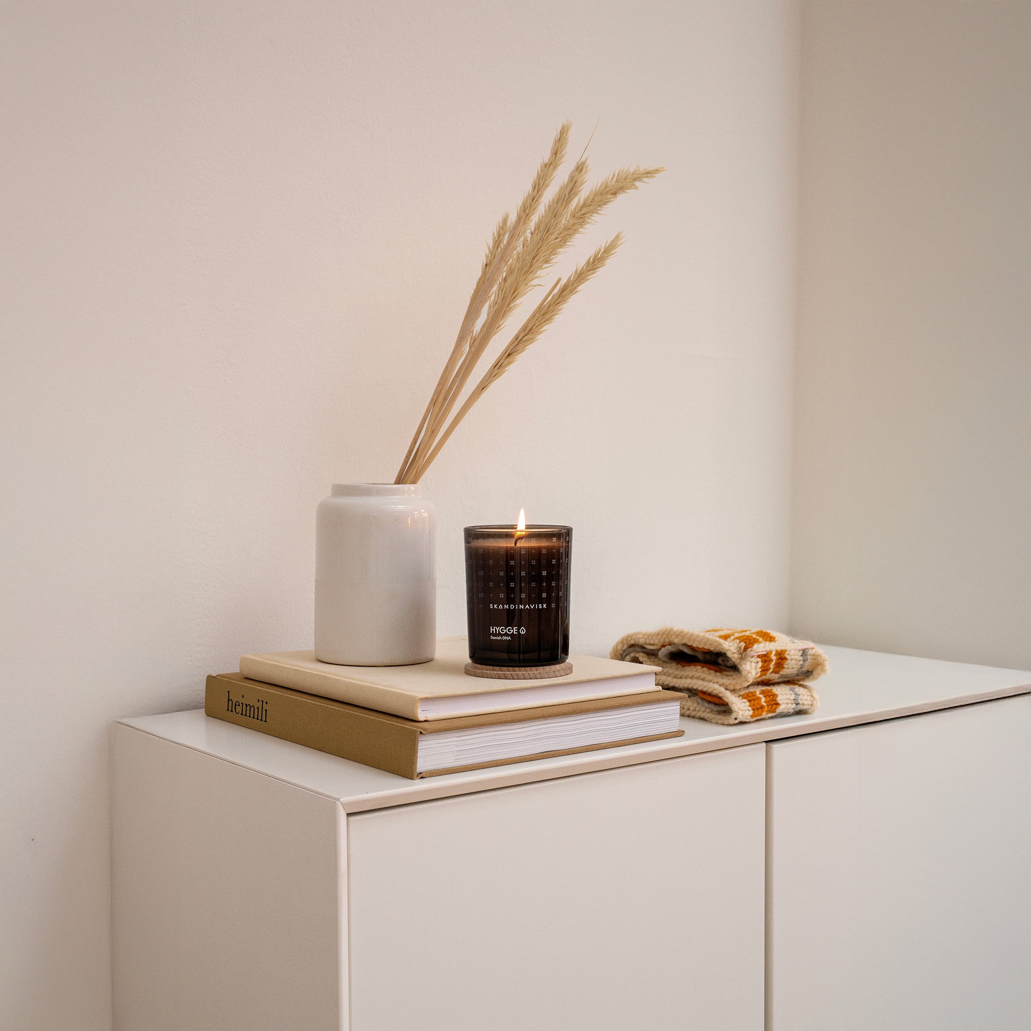 Skandinavisk Hygge 200g scented candle in frosted glass jar with wooden lid.