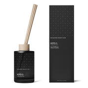 Skandinavisk Koto 200ml scent diffuser in painted glass bottle with wooden ring and reeds.