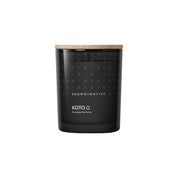 Skandinavisk Koto scented candle 200g in painted glass with beechwood lid. Amber, vanilla, and orange notes; vegan wax; Nordic home scent.