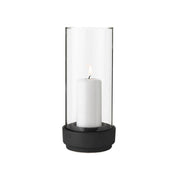 Stelton Hurricane Candleholder Large in black stoneware with glass shade, weather-resistant for indoor or outdoor candlelight.