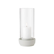 Stelton Hurricane Candleholder Large in sand stoneware with glass shade, weather-resistant for indoor or outdoor candlelight.