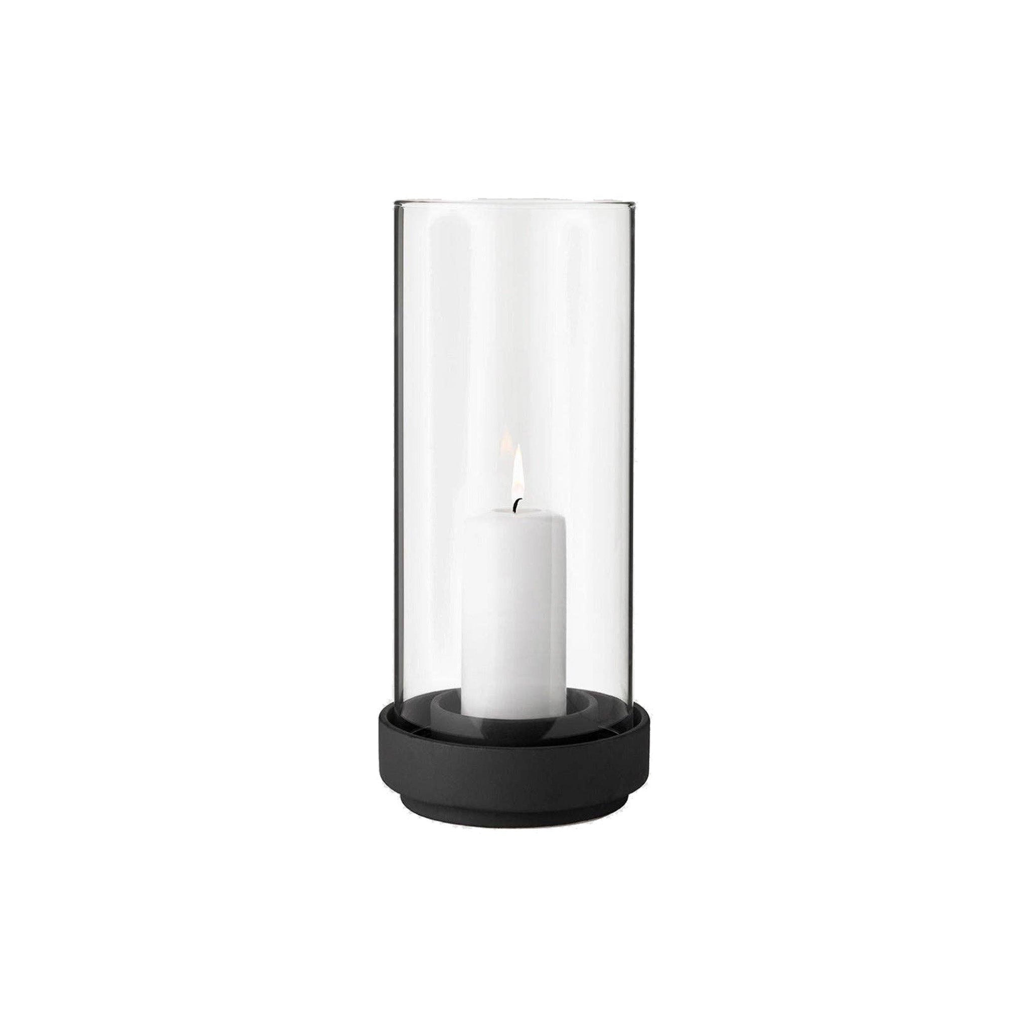 Stelton Hurricane Candleholder Small in black stoneware with glass shade, weather-resistant for indoor or outdoor candlelight.