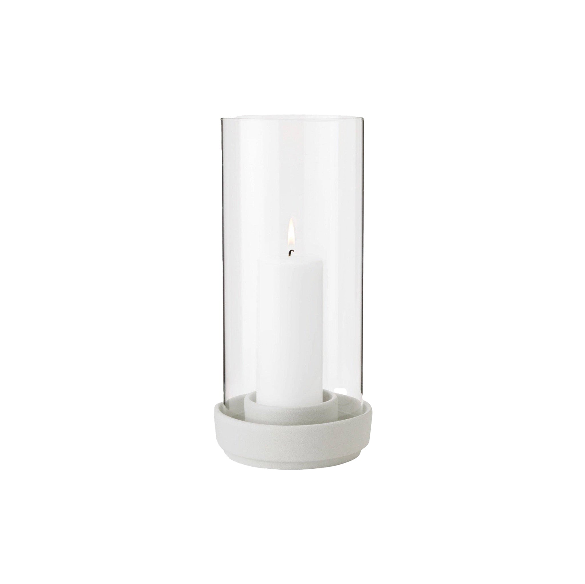 Stelton Hurricane Candleholder Small in sand stoneware with glass shade, weather-resistant for indoor or outdoor candlelight.