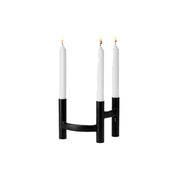 Stelton Ora Three-Branch Candleholder in black with organic sculptural design, holds three candles.
