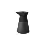 Stelton Theo Milk Jug in matte black stoneware with glossy interior and silicone collar, designed by Francis Cayouette. Rustic yet modern Nordic jug, 0.4 L.