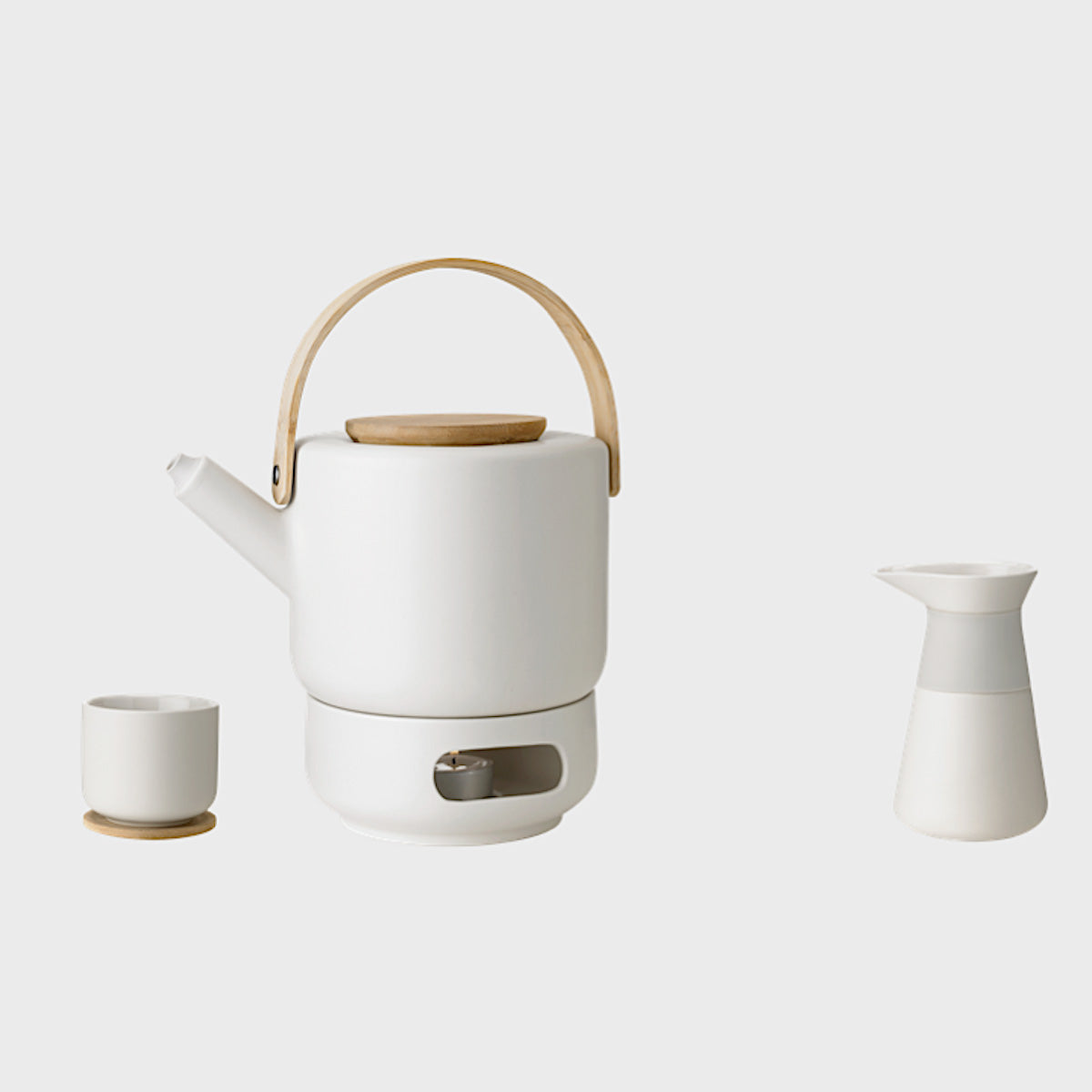 Stelton Theo Set in matte sand stoneware with glossy interior, designed by Francis Cayouette. Rustic yet modern Nordic.