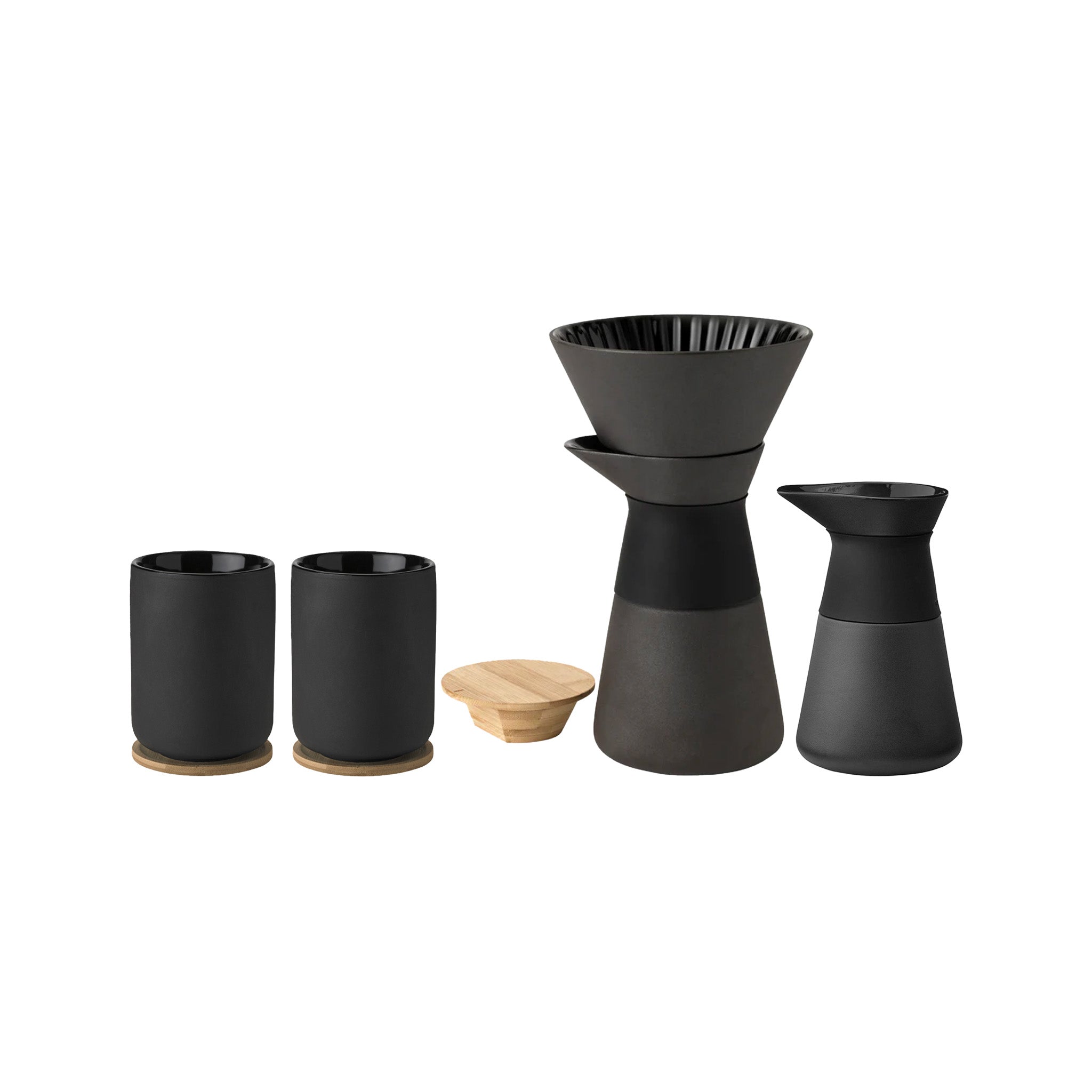 Stelton Theo Slow Brew Coffee Bundle in matte black or sand stoneware with glossy interiors. Includes Slow Brew Coffee Maker, Milk Jug, and two Thermo Cups with bamboo coasters. Designed by Francis Cayouette.
