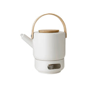 Stelton Theo Teapot + Warmer Bundle in matte black or sand stoneware with glossy interiors. Includes Teapot and matching Tea Warmer. Designed by Francis Cayouette.