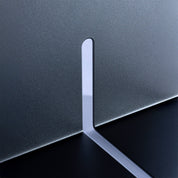 Tortuga Forma Graphite Bookend, solid steel arc design for supporting cookbooks, magazines, and novels.