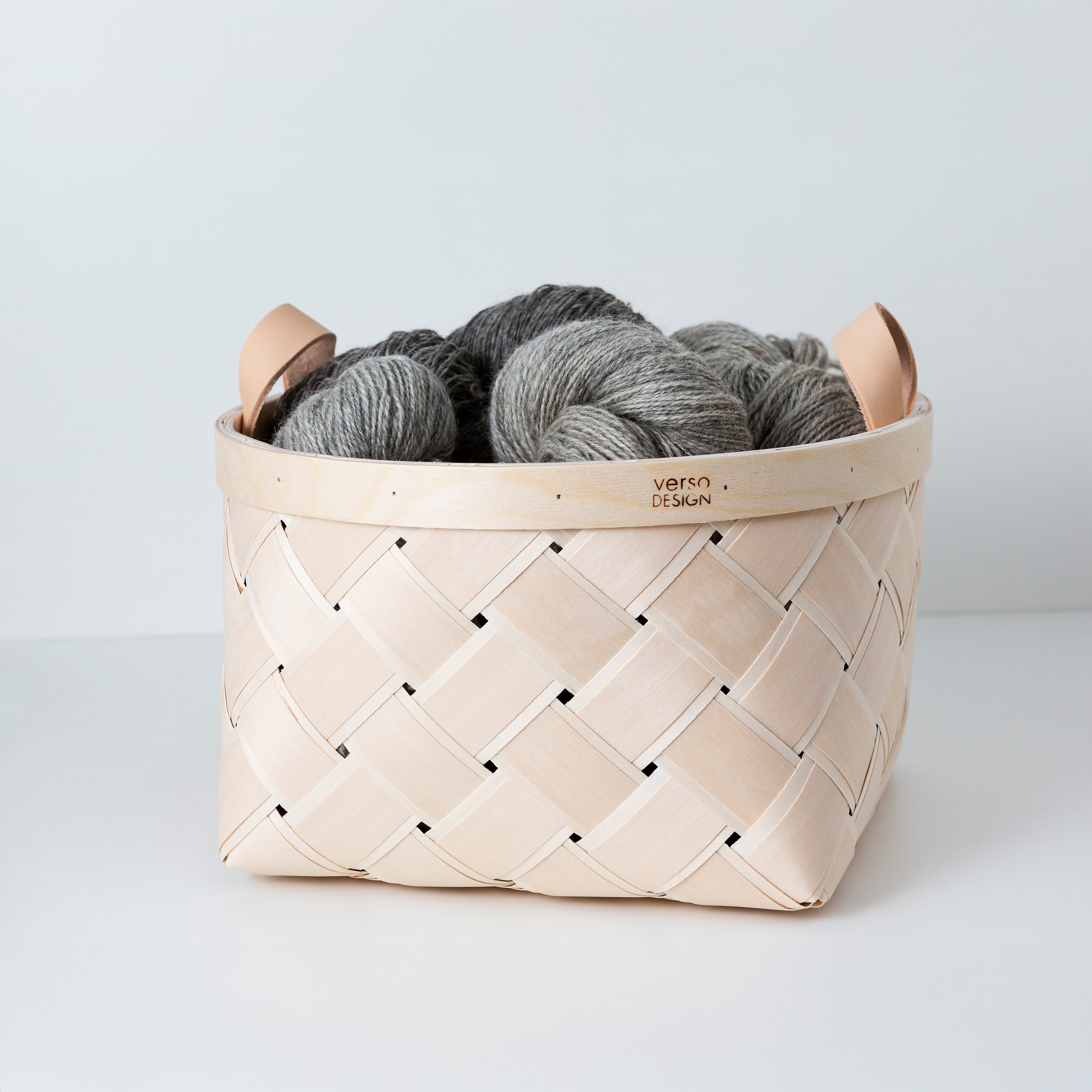 Verso Design Lastu Round Birch Basket in FSC-certified birch with wool felt or leather handles, sustainably handcrafted in Finland for lasting, eco-friendly storage.