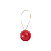 PALLO Ornament by Verso Design — birch wood sphere ornament with leather loop, available in natural or red, inspired by Finnish forests.
